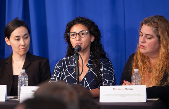 Photo of Olivia Calderon talking about financial empowerment efforts for low-income and unauthorizd immigrants